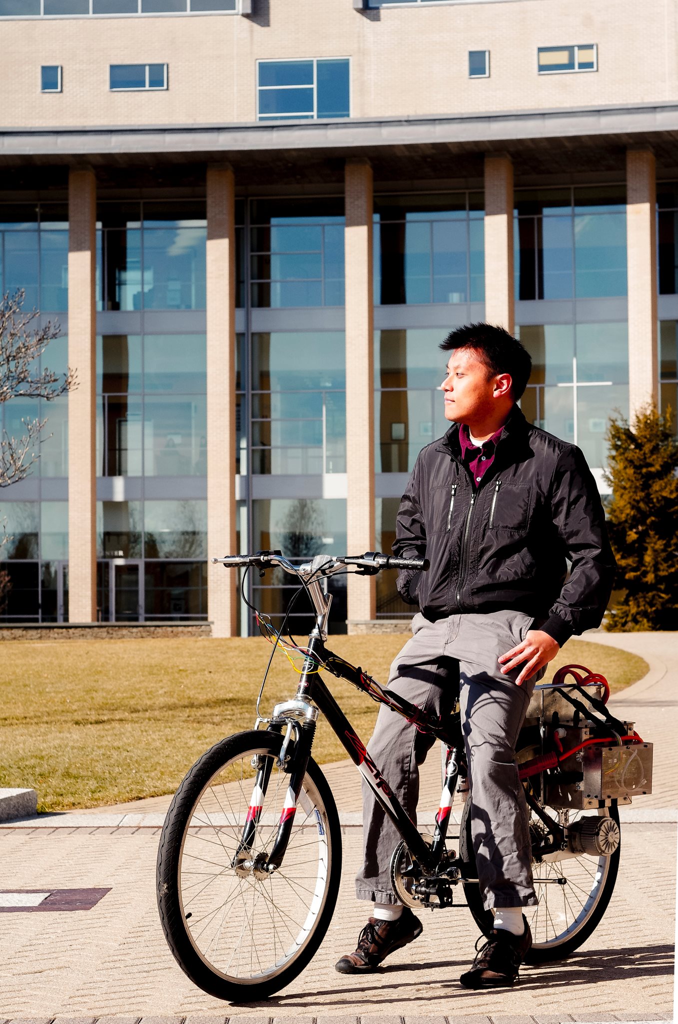 Proud to ride our first vehicle - an electric bicycle.